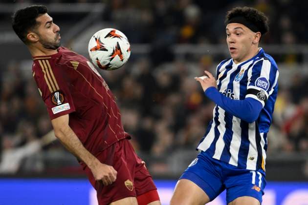 Mehmet Zeki Celik of AS Roma and Eduardo Gabriel Aquino Cossa of FC Porto compete for the ball during the Europa League football match between AS Roma and FC Porto at Olimpico stadium in Rome (Italy), February 20, 2025. andreaxstaccioli