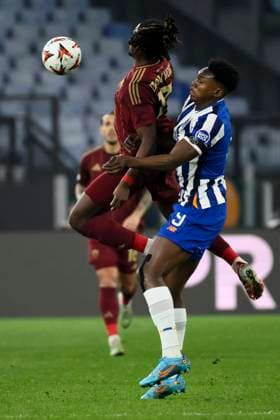 Kouadio Kone of AS Roma and Samuel Omorodion Aghehowa of FC Porto during the Europa League football match between AS Roma and FC Porto at Olimpico stadium in Rome (Italy), February 20, 2025. andreaxstaccioli