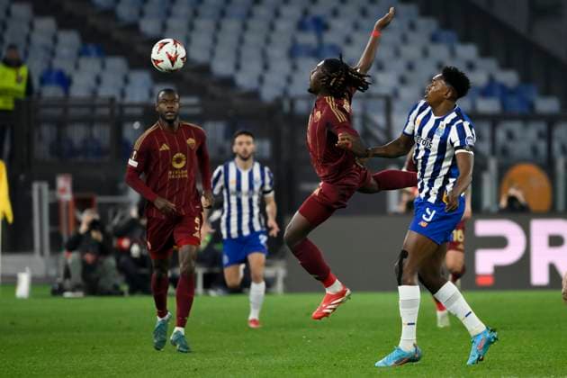 Kouadio Kone of AS Roma and Samuel Omorodion Aghehowa of FC Porto during the Europa League football match between AS Roma and FC Porto at Olimpico stadium in Rome (Italy), February 20, 2025. andreaxstaccioli