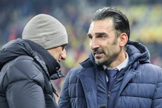 Thu 20 February, UEFA Europa League, League Knockout phase play-offs 2nd leg, National Arena, Bucharest, FCSB vs PAOK Coach Elias Charalambous and Coach Razvan Lucescu talk