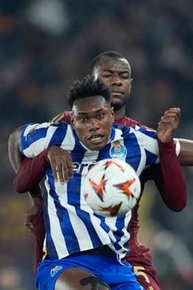 Samu Omorodion (Porto FC) and Evan Ndicka (AS Roma) battle for the ball, UEFA Europa League 2024 25 League Knockout Play-off Second Leg, AS Roma v FC Porto, Olimpico Stadium , February 20, 2025, Rome, Italy.