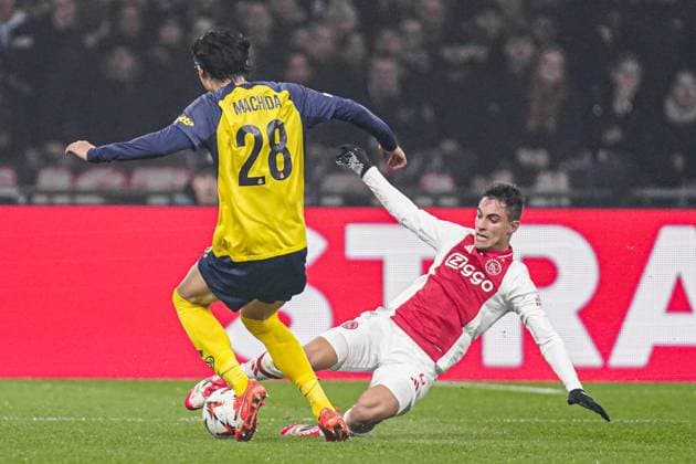 2025-02-20 AFC Ajax v R. Union Saint-Gilloise - UEFA Europa League 2024 25 League Knockout Play-off Second Leg AMSTERDAM, NETHERLANDS - FEBRUARY 20: Koki Machida of R. Union Saint-Gilloise gets tackled by Lucas Rosa of AFC Ajax during the UEFA Europa League 2024 25 League Knockout Play-off Second Leg match between AFC Ajax and R. Union Saint-Gilloise at Johan Cruijff Arena on February 20, 2025 in Amsterdam, Netherlands. Amsterdam Johan Cruijff Arena Netherlands Content not available for redistribution in The Netherlands directly or indirectly through any third parties. Copyright: xJorisxVerwijstx