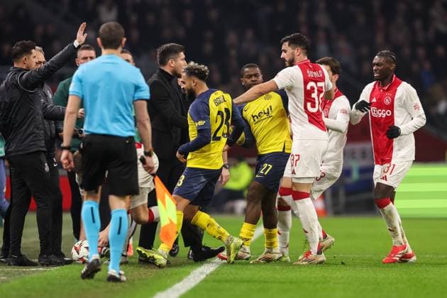 2025-02-20 AFC Ajax v R. Union Saint-Gilloise - UEFA Europa League 2024 25 League Knockout Play-off Second Leg AMSTERDAM, NETHERLANDS - FEBRUARY 20: Josip Sutalo of AFC Ajax pulls Sofiane Boufal of R. Union Saint-Gilloise during the UEFA Europa League 2024 25 League Knockout Play-off Second Leg match between AFC Ajax and R. Union Saint-Gilloise at Johan Cruijff Arena on February 20, 2025 in Amsterdam, Netherlands. Amsterdam Johan Cruijff Arena Netherlands Content not available for redistribution in The Netherlands directly or indirectly through any third parties. Copyright: xBenxGalx