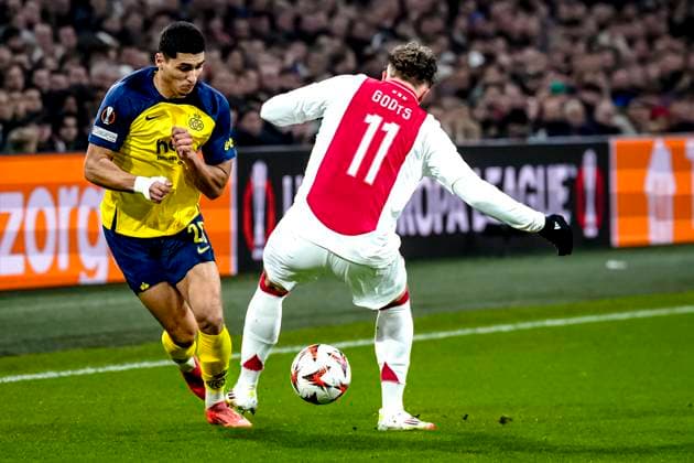 Union Saint Gilloise forwarder Anan Khalaili, AFC Ajax Amsterdam forwarder Mika Godts during the match Ajax Union SG at the Johan Cruijff ArenA for the UEFA Europa League Knockout phase play offs 2nd leg season 2024 2025 in AMSTERDAM, Netherlands on 20 february 2025, photo by Marcel van Dorst EYE4images DeFodi Images