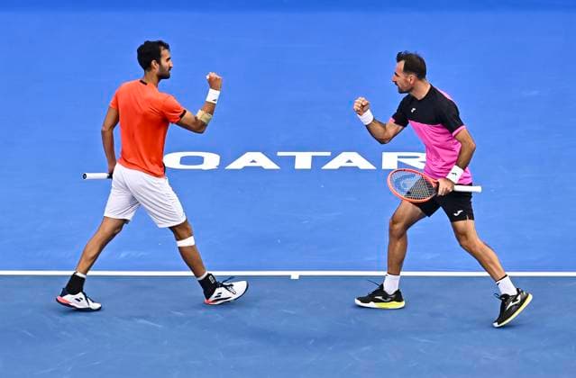 ATP, Tennis Herren QATAR EXXONMOBIL OPEN Yuki Bhambri of India and Ivan Dodig of Croatia react during men s doubles Semifinals match against Ulian Cash and Lloyd Glasspool of Great Britain at the ATP Qatar ExxonMobil Open 2025 tennis tournament at the Khalifa International Tennis Complex in Doha, Qatar on February 21, 2025. DOHA Qatar Copyright: xNOUSHADx
