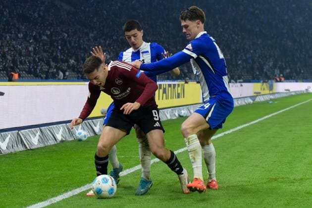 Soccer 2 Bundesliga, Hertha BSC Berlin 1 FC Nuremberg 21 02 2025, xdanx, Soccer 2 Bundesliga, Hertha BSC Berlin 1 FC Nuremberg v l Stefanos Tzimas 1 FC Nuremberg 9 Ibrahim Maza Hertha BSC 10 ,Linus Gechter Hertha BSC 44 ,duel, duel, fight, tackle DFL DFB REGULATIONS PROHIBIT ANY USE OF PHOTOGRAPHS as IMAGE SEQUENCES and or QUASI VIDEO Daniel Lakomski Mix1 Berlin Olympiastadion Berlin Germany DEU Copyright: xDanielxLakomskix