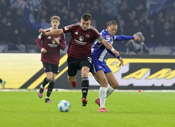 21 02 2025 Soccer Season 2024 2025 2 Soccer Bundesliga 23 Matchday Hertha BSC Berlin HBSC 1 FC Nürnberg FCN Club Sportfoto Zink DaMa xdaxmax DFL regulations prohibit any use of photographs as image sequences and or quasi video only for editorial use Robin Knoche 31, 1 FC Nürnberg FCN Derry Scherhant 39, Hertha BSC Berlin