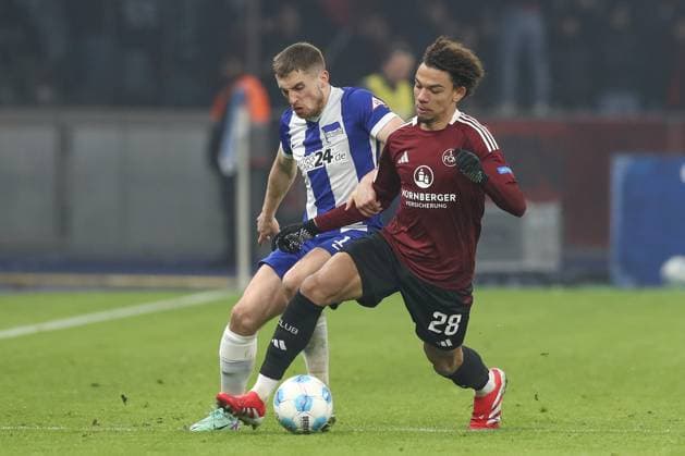 21 02 2025, xtgx, Soccer 2 Bundesliga, Hertha BSC Berlin 1 FC Nuernberg emspor, v l Jonjoe Kenny Hertha, 16 , Janis Antiste Nuernberg, 28 duel, duel, fight, tackle DFL DFB REGULATIONS PROHIBIT ANY USE OF PHOTOGRAPHS as IMAGE SEQUENCES and or QUASI VIDEO Berlin