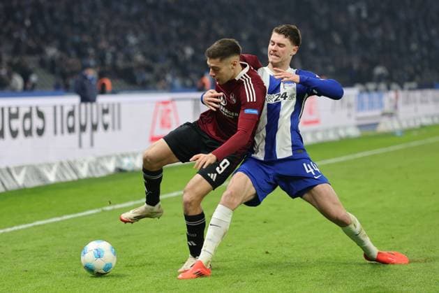 2 Soccer Bundesliga Hertha BSC 1 FC Nuremberg Linus Gechter Hertha BSC Berlin 44 in a duel with Stefanos Tzimas Nuremberg 9 , during the match in the 2 Soccer Bundesliga Hertha BSC 1 FC Nuremberg in Berlin, Olympiastadion, on 21 02 2025 DFB regulations prohibit any use of photographs as image sequences and or quasi video Copyright: xBEAUTIFULxSPORTS Frankex