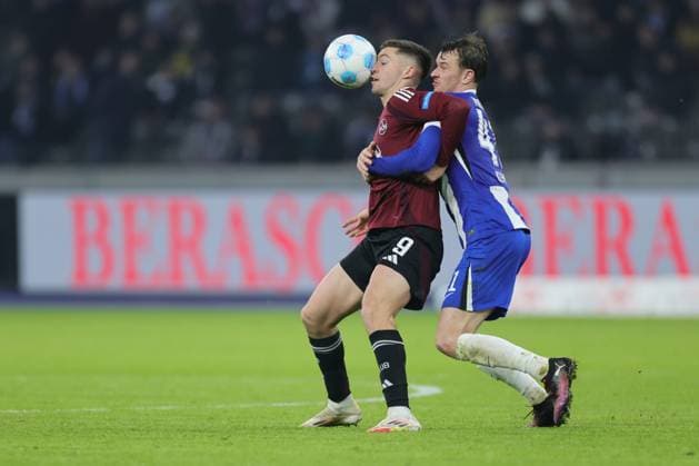 2 Soccer Bundesliga Hertha BSC 1 FC Nuremberg Pascal Klemens Hertha BSC Berlin 41 in a duel with Stefanos Tzimas Nuremberg 9 , during the match in the 2 Soccer Bundesliga Hertha BSC 1 FC Nuremberg in Berlin, Olympiastadion, on 21 02 2025 DFB regulations prohibit any use of photographs as image sequences and or quasi video Copyright: xBEAUTIFULxSPORTS Frankex