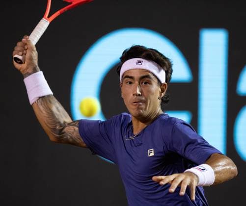 (250222) -- RIO DE JANEIRO, Feb. 22, 2025 -- Francisco Comesana of Argentina hits a return during the men s singles quarterfinal match against Alexander Zverev of Germany at the 2025 ATP, Tennis Herren 500 Rio Open at Jockey Club Brasileiro in Rio de Janeiro, Brazil, Feb. 21, 2025. ) (SP)BRAZIL-RIO DE JANEIRO-TENNIS-RIO OPEN-MEN S SINGLES-QUARTERFINAL WangxTiancong 