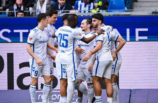 Baris Atik 1 FC Magdeburg celebrates his goal with his teammates during the 2 Bundesliga match between Karlsruher SC and 1 FC Magdeburg at BBBank Wildpark on February 22, 2025 in Karlsruhe, Germany, Germany Photo by Silas Schüller DeFodi Images Baris Atik 1 FC Magdeburg celebrates his goal with his teammates during the 2 Bundesliga match between Karlsruher SC and 1 FC Magdeburg at BBBank Wildpark on February 22, 2025 in Karlsruhe, Germany Photo by Silas Schüller DeFodi Images DFB DFL REGULATIONS PROHIBIT ANY USE OF PHOTOGRAPHS AS IMAGE SEQUENCES AND OR QUASI VIDEO Photo by Silas Schueller DeFodi Images