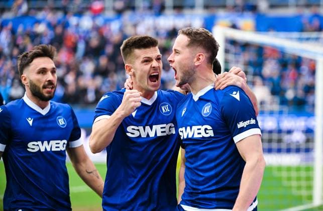 Christoph Kobald Karlsruher SC celebrates his goal with Marvin Wanitzek Karlsruher SC during the 2 Bundesliga match between Karlsruher SC and 1 FC Magdeburg at BBBank Wildpark on February 22, 2025 in Karlsruhe, Germany, Germany Photo by Silas Schüller DeFodi Images Christoph Kobald Karlsruher SC Karlsruher SC celebrates his goal with Marvin Wanitzek Karlsruher SC during the 2 Bundesliga match between Karlsruher SC and 1 FC Magdeburg at BBBank Wildpark on February 22, 2025 in Karlsruhe, Germany Photo by Silas Schüller DeFodi Images DFB DFL REGULATIONS PROHIBIT ANY USE OF PHOTOGRAPHS AS IMAGE SEQUENCES AND OR QUASI VIDEO Photo by Silas Schueller DeFodi Images