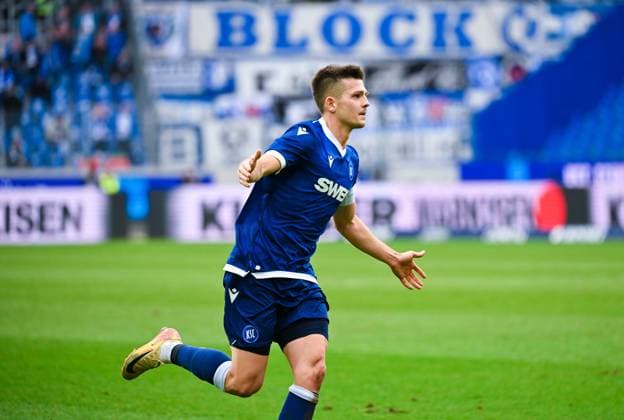 Marvin Wanitzek Karlsruher SC celebrates his goal during the 2 Bundesliga match between Karlsruher SC and 1 FC Magdeburg at BBBank Wildpark on February 22, 2025 in Karlsruhe, Germany Photo by Silas Schüller DeFodi Images Marvin Wanitzek Karlsruher SC celebrates his goal during the 2 Bundesliga match between Karlsruher SC and 1 FC Magdeburg at BBBank Wildpark on February 22, 2025 in Karlsruhe, Germany Photo by Silas Schüller DeFodi Images DFB DFL REGULATIONS PROHIBIT ANY USE OF PHOTOGRAPHS AS IMAGE SEQUENCES AND OR QUASI VIDEO Photo by Silas Schueller DeFodi Images