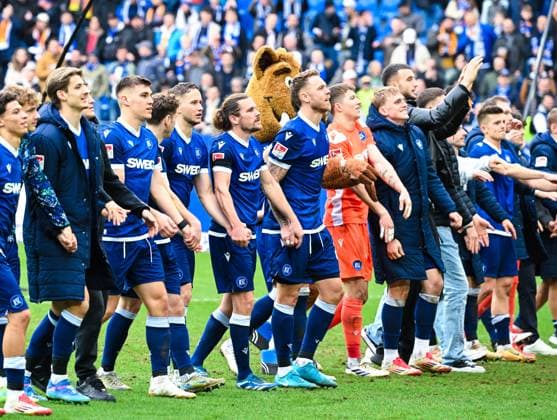 Players of Karlsruher SC celebrate the win after the 2 Bundesliga match between Karlsruher SC and 1 FC Magdeburg at BBBank Wildpark on February 22, 2025 in Karlsruhe, Germany Germany Photo by Silas Schüller DeFodi Images Players of Karlsruher SC celebrate the win after the 2 Bundesliga match between Karlsruher SC and 1 FC Magdeburg at BBBank Wildpark on February 22, 2025 in Karlsruhe, Germany Photo by Silas Schüller DeFodi Images DFB DFL REGULATIONS PROHIBIT ANY USE OF PHOTOGRAPHS AS IMAGE SEQUENCES AND OR QUASI VIDEO