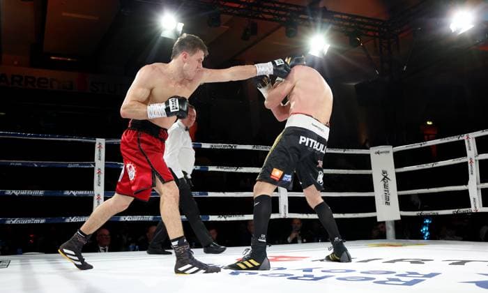 Bilder des Jahres 2025, Sport 02 Februar Sport Themen der Woche KW08 Sport Bilder des Tages BAU 22.02.2025 Stuttgart Boxen Stuttgarter Boxnacht, Simon Zachenhuber (GER, rot) vs. Robert Talarek (Polen, schwarz) *** BAU 22 02 2025 Stuttgart Boxing Stuttgart Boxing Night, Simon Zachenhuber GER, red vs Robert Talarek Poland, black