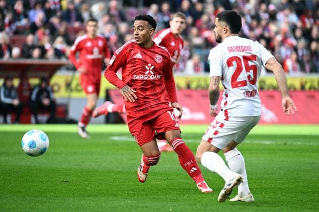 Football, Bundesliga, Germany, Men, Season 2024 2025, Matchday 23, Rhein Energie Stadion Köln, 1 FC Köln Fortuna Düsseldorf Myron van Brederode F95 , Jusuf Gazibegovic KOE Action