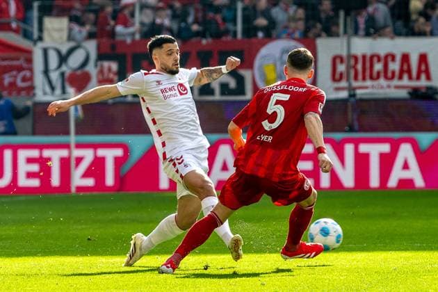 23 02 2025, Soccer 2 Bundesliga, Season 2024 2025, Matchday 23, 1 FC Koeln Fortuna Duesseldorf in the RheinEnergieStadion in Koeln duel between Jusuf Gazibegovic 1 FC Koeln, 25 and Moritz Heyer Fortuna Duessledorf, 05 Important note In accordance with the regulations of the DFL German Football League and the DFB German Football Association, it is prohibited to utilize or have utilized photographs taken in the stadium or of the match in the form of sequential images or video-like photo series Foto Kirchner Media Thomas Haesler Copyright: xKirchner-Media ThomasxHaeslerx