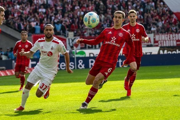 23 02 2025, Soccer 2 Bundesliga, Season 2024 2025, Matchday 23, 1 FC Koeln Fortuna Duesseldorf in the RheinEnergieStadion in Koeln duel between Linton Maina 1 FC Koeln, 37 and Giovanni Haag Fortuna Duesseldorf, 06 Important note In accordance with the regulations of the DFL German Football League and the DFB German Football Association, it is prohibited to utilize or have utilized photographs taken in the stadium or of the match in the form of sequential images or video-like photo series Foto Kirchner Media Thomas Haesler Copyright: xKirchner-Media ThomasxHaeslerx