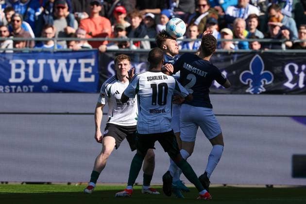 2025 02 23 xJFAx 2 Bundesliga 2024 25 23 Matchday SV Darmstadt 98 FC Schalke 04 v l , Luca Marseiler SV Darmstadt 98 , Pape Ba FC Schalke 04 ,Sergio Lopez SV Darmstadt 98 , header, header duel DFL DFB REGULATIONS PROHIBIT ANY USE OF PHOTOGRAPHS as IMAGE SEQUENCES and or QUASI VIDEO Copyright: JoaquimxFerreira