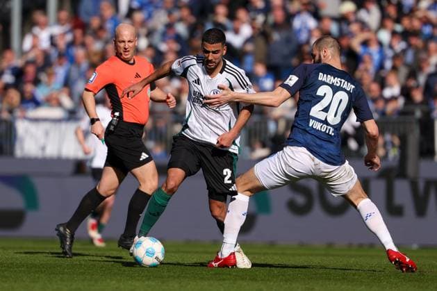 2025 02 23 xJFAx 2 Bundesliga 2024 25 23 Matchday SV Darmstadt 98 FC Schalke 04 v l , Aymen Barkok FC Schalke 04 , Aleksander Vukovic SV Darmstadt 98 , Zweikampf, Action, Aktion, Battles for the Ball DFL DFB REGULATIONS PROHIBIT ANY USE OF PHOTOGRAPHS as IMAGE SEQUENCES and or QUASI VIDEO Copyright: JoaquimxFerreira