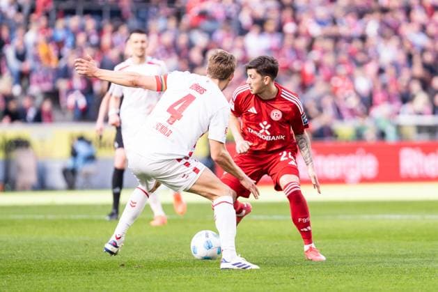 GER, 2 FBL, 1 FC Köln Koeln vs Fortuna Düsseldorf Duesseldorf 23 02 2025, Rheinenergie Stadion, Köln, GER, 2 FBL, 1 FC Köln Koeln vs Fortuna Düsseldorf Duesseldorf In the picture duel between Dawid Kownacki Fortuna Düsseldorf Fortuna Duesseldorf, 24 and Timo Hübers Huebers 1 FC Köln Koeln, 4 nordphotoxGmbHxx xChristianxSchulze nph000300