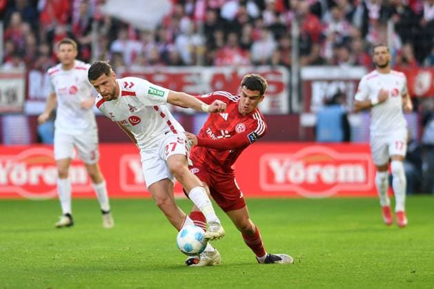 Imad Rondic 1 FC Koeln and Giovanni Haag Fortuna Duesseldorf battle for the ball during the 2 Bundesliga match between 1 FC Koeln and Fortuna Duesseldorf at RheinEnergieStadion on February 23, 2025 in Cologne, Germany, Germany Photo by Ralf Treese DeFodi Images Imad Rondic 1 FC Koeln and Giovanni Haag Fortuna Duesseldorf battle for the ball during the 2 Bundesliga match between 1 FC Köln and Fortuna Düsseldorf at RheinEnergieStadion on February 23, 2025 in Cologne, Germany Photo by Ralf Treese DeFodi Images DFB DFL REGULATIONS PROHIBIT ANY USE OF PHOTOGRAPHS AS IMAGE SEQUENCES AND OR QUASI VIDEO Photo by Ralf Treese DeFodi Images