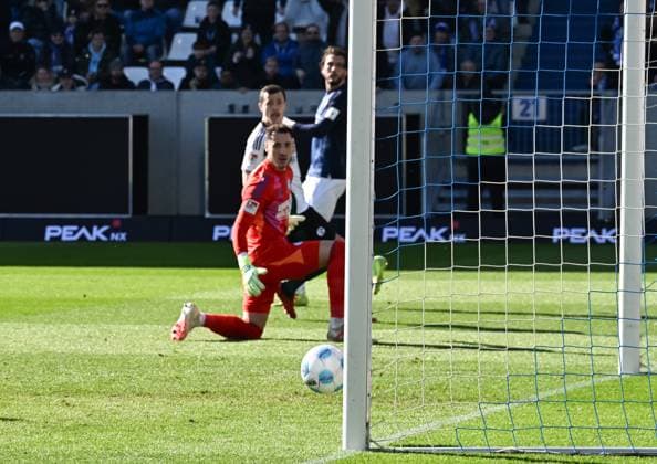 23 02 2025, xsltx, Soccer 2 Bundesliga, SV Darmstadt 98 FC Schalke 04 v l Fraser Hornby SV Darmstadt 98 pushes the ball past Justin Heekeren FC Schalke 04, but only hits the post DFL DFB REGULATIONS PROHIBIT ANY USE OF PHOTOGRAPHS as IMAGE SEQUENCES and or QUASI VIDEO