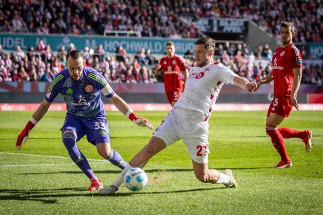 2 Soccer Bundesliga 1 FC Köln Fortuna Düsseldorf, 23 02 2025 Florian Kastenmeier Fortuna Düsseldorf, 33 and Imad Rondic 1 FC Köln, 27 Cologne, 23 02 2025 1 FC Köln Fortuna Düsseldorf 23 Matchday of 2 Soccer Bundesliga , 1 FC Köln Fortuna Düsseldorf at the Rhein Energie Stadion in Cologne DFL REGULATIONS PROHIBIT ANY USE OF PHOTOGRAPHS AS IMAGE SEQUENCES AND OR QUASI VIDEO Copyright: xBEAUTIFULxSPORTS LeahxKohringx