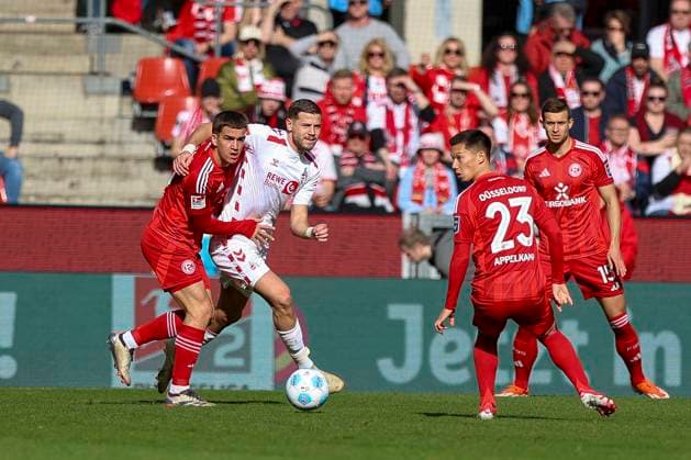 Cologne, Germany, 23 02 25 Giovanni Antoine Haag Fortuna Düsseldorf and Imad Rondic 1 FC Köln fighting for the ball during the 2 Bundesliga match between 1 FC Köln vs Fortuna Düsseldorf at RheinEnergieStadion Cologne RheinEnergieStadion North Rhine Westphalia Germany Copyright: xBrauer-Fotoagenturx xAdrianxSchlx