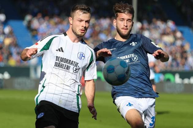 Darmstadt, Germany February 23, 2025 2 Liga 2024 2025 SV Darmstadt 98 vs FC Schalke 04 In the picture from left in a duel Adrian Gantenbein Schalke, 17 and Killian Corredor Darmstadt, 34 , DFL regulations prohibit any use of photographs as image sequences and or quasi video Merck Stadion am Böllenfalltor Hessen Copyright: xFotostandx xUlrichxScherbaumx