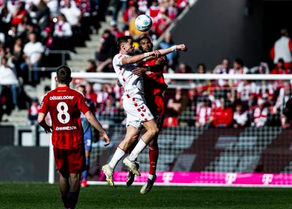 Köln, RheinEnergieStadion, 23 02 2025 Imad Rondic of Koeln jumps for a header against Siebert Jamil of Duesseldorf during the 2 Bundesliga match 1 FC Koeln vs Fortuna Duesseldorf