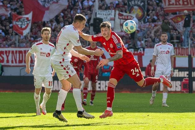 23 02 2025, Soccer 2 Bundesliga, Season 2024 2025, Matchday 23, 1 FC Koeln Fortuna Duesseldorf in the RheinEnergieStadion in Koeln duel between Dominique Heintz 1 FC Koeln, 03 and David Kownacki Fortuna Duesseldorf, 24 Important note In accordance with the regulations of the DFL German Football League and the DFB German Football Association, it is prohibited to utilize or have utilized photographs taken in the stadium and or of the match in the form of sequential images and or video-like photo series Foto Kirchner Media Thomas Haesler Copyright: xKirchner-Media ThomasxHaeslerx