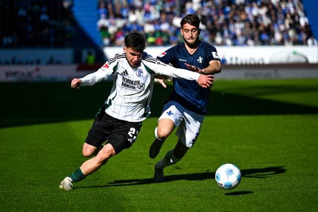 Mehmet Aydın FC Schalke 04, 23 in duel with Killian Corredor SV Darmstadt 98, 34 , GER, SV Darmstadt 98 vs FC Schalke 04, Football, Matchday 23, Season 2024 2025, 23 02 2025 DFL REGULATIONS PROHIBIT ANY USE OF PHOTOGRAPHS as IMAGE SEQUENCES and or QUASI VIDEO GER, SV Darmstadt 98 vs FC Schalke 04, Football, Matchday 23, Season 2024 2025, 23 02 2025 Darmstadt Copyright: xEibner-Pressefoto FlorianxWieganx EP_FWD