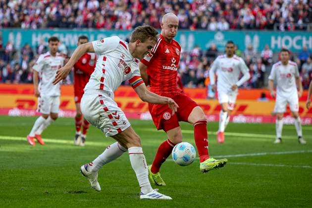 Cologne, Germany, 23 02 25 Timo Hübers 1 FC Köln and Valgeir Lunddal Fridriksson Fortuna Düsseldorf fighting for the ball during the 2 Bundesliga match between 1 FC Köln vs Fortuna Düsseldorf at RheinEnergieStadion Cologne RheinEnergieStadion North Rhine Westphalia Germany Copyright: xBrauer-Fotoagenturx xAdrianxSchlx