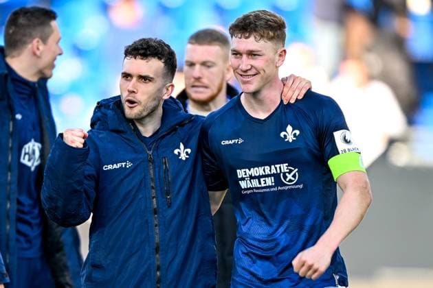 Sergio Lopez SV Darmstadt 98, 02 and Clemens Riedel SV Darmstadt 98, 38 are happy about the victory, GER, SV Darmstadt 98 vs FC Schalke 04, Football, Matchday 23, Season 2024 2025, 23 02 2025 DFL REGULATIONS PROHIBIT ANY USE OF PHOTOGRAPHS as IMAGE SEQUENCES and or QUASI VIDEO GER, SV Darmstadt 98 vs FC Schalke 04, Football, Matchday 23, Season 2024 2025, 23 02 2025 Darmstadt Copyright: xEibner-Pressefoto FlorianxWieganx EP_FWD