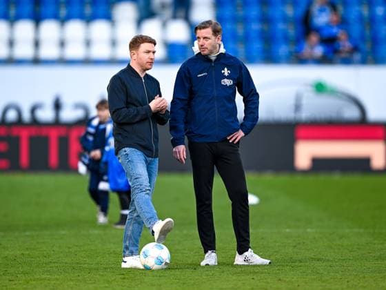 Florian Kohfeldt SV Darmstadt 98, Coach and Paul Fernie SV Darmstadt 98, Sports Director , GER, SV Darmstadt 98 vs FC Schalke 04, Football, Matchday 23, Season 2024 2025, 23 02 2025 DFL REGULATIONS PROHIBIT ANY USE OF PHOTOGRAPHS as IMAGE SEQUENCES and or QUASI VIDEO GER, SV Darmstadt 98 vs FC Schalke 04, Football, Matchday 23, Season 2024 2025, 23 02 2025 Darmstadt Copyright: xEibner-Pressefoto FlorianxWieganx EP_FWD
