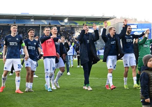 23 02 2025, xsltx, Soccer 2 Bundesliga, SV Darmstadt 98 FC Schalke 04 v l Darmstadt celebrates the 2 0 against Schalke DFL DFB REGULATIONS PROHIBIT ANY USE OF PHOTOGRAPHS as IMAGE SEQUENCES and or QUASI VIDEO