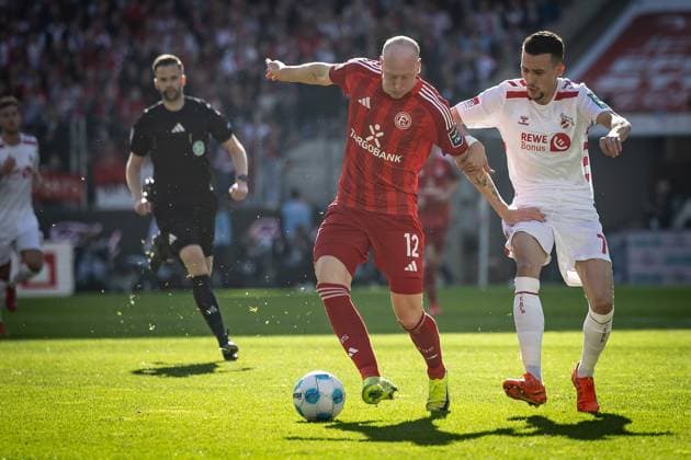 2 Soccer Bundesliga 1 FC Köln Fortuna Düsseldorf, 23 02 2025 Valgeir Lunddal Fortuna Düsseldorf, 12 and Dejan Ljubicic 1 FC Köln, 7 in duel Cologne, 23 02 2025 1 FC Köln Fortuna Düsseldorf 23 Matchday of 2 Soccer Bundesliga , 1 FC Köln Fortuna Düsseldorf at the Rhein Energie Stadion in Cologne DFL REGULATIONS PROHIBIT ANY USE OF PHOTOGRAPHS AS IMAGE SEQUENCES AND OR QUASI VIDEO Copyright: xBEAUTIFULxSPORTS LeahxKohringx