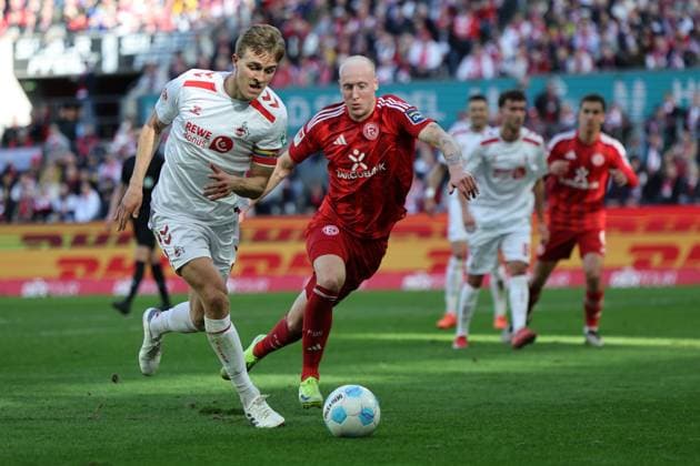 GER, 2 FBL, 1 FC Koeln vs Fortuna Duesseldorf 23 02 2025, Rheinenergie Stadion, Koeln, GER, 2 FBL, 1 FC Koeln vs Fortuna Duesseldorf , in the picture Timo Hübers Huebers FC Koeln 4 , in a duel against Valgeir Lunddal FriÃ°riksson Fortuna Duesseldorf 12 , nordphotoxGmbHx xMeuter nph00351