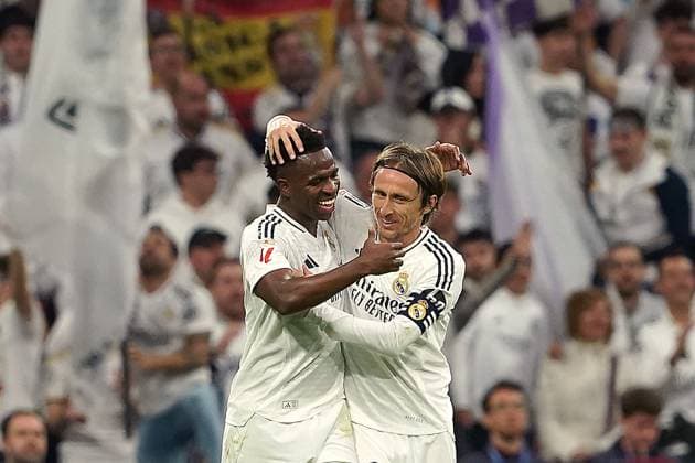 Sport Bilder des Tages REAL MADRID v GIRONA FC. LA LIGA 2024 2025. ROUND 25. Real Madrid s Vinicius Junior (l) and Luka Modric celebrate goal during La Liga match. February 23, 2025. (ALTERPHOTOS Acero) MadridSpain  Copyright: xAcerox