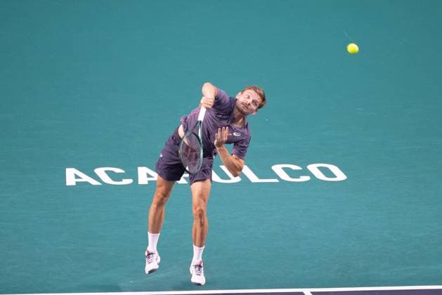 (250227) -- ACAPULCO, Feb. 27, 2025 -- David Goffin of Belgium serves during the men s singles round of 16 match against Ben Shelton of the United States at the 2025 ATP, Tennis Herren Mexican Open tennis tournament in Acapulco, Mexico, Feb. 26, 2025. ) (SP)MEXICO-ACAPULCO-TENNIS-ATP-MEXICAN OPEN-MEN S SINGLES LixMengxin 