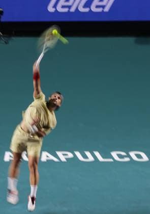 (250228) -- ACAPULCO, Feb. 28, 2025 -- Marcos Giron of the United States serves during the singles quarterfinal match against Denis Shapovalov of Canada at the 2025 ATP, Tennis Herren Mexican Open tennis tournament in Acapulco, Mexico, Feb. 27, 2025. (Photo by Xinhua) (SP)MEXICO-ACAPULCO-TENNIS-ATP-MEXICAN OPEN-SINGLES-QUARTERFINAL FranciscoxCanedo 