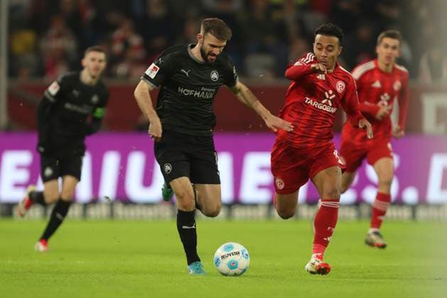 Simon Asta SpVgg Greuther Fürth and Mayron van Brederode Fortuna Duesseldorf battle for the ball during the 2 Bundesliga match between Fortuna Düsseldorf and SpVgg Greuther Fürth at Merkur Spiel Arena on February 28, 2025 in Düsseldorf, Germany, Germany Photo by Oliver Kaelke DeFodi Images Simon Asta SpVgg Greuther Fürth and Mayron van Brederode Fortuna Duesseldorf battle for the ball during the 2 Bundesliga match between Fortuna Düsseldorf and SpVgg Greuther Fürth at Merkur Spiel Arena on February 28, 2025 in Düsseldorf, Germany Photo by Oliver Kaelke DeFodi Images DFB DFL REGULATIONS PROHIBIT ANY USE OF PHOTOGRAPHS AS IMAGE SEQUENCES AND OR QUASI VIDEO Photo by Oliver Kaelke DeFodi Images