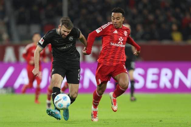 Simon Asta SpVgg Greuther Fürth and Mayron van Brederode Fortuna Duesseldorf battle for the ball during the 2 Bundesliga match between Fortuna Düsseldorf and SpVgg Greuther Fürth at Merkur Spiel Arena on February 28, 2025 in Düsseldorf, Germany, Germany Photo by Oliver Kaelke DeFodi Images Simon Asta SpVgg Greuther Fürth and Mayron van Brederode Fortuna Duesseldorf battle for the ball during the 2 Bundesliga match between Fortuna Düsseldorf and SpVgg Greuther Fürth at Merkur Spiel Arena on February 28, 2025 in Düsseldorf, Germany Photo by Oliver Kaelke DeFodi Images DFB DFL REGULATIONS PROHIBIT ANY USE OF PHOTOGRAPHS AS IMAGE SEQUENCES AND OR QUASI VIDEO Photo by Oliver Kaelke DeFodi Images