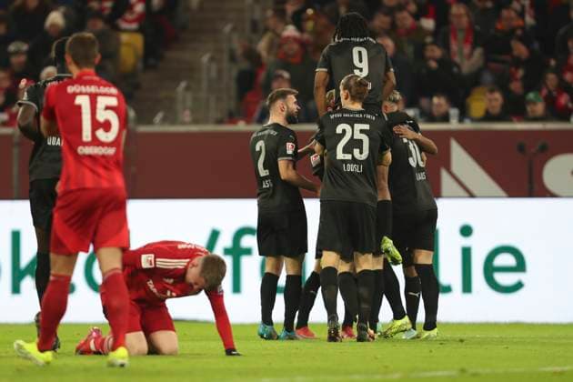 Branimir Hrgota SpVgg Greuther Fürth celebrates after scoring his team s first goal with teammates during the 2 Bundesliga match between Fortuna Düsseldorf and SpVgg Greuther Fürth at Merkur Spiel Arena on February 28, 2025 in Düsseldorf, Germany, Germany Photo by Oliver Kaelke DeFodi Images Branimir Hrgota SpVgg Greuther Fürth celebrates after scoring his team s first goal with teammates during the 2 Bundesliga match between Fortuna Düsseldorf and SpVgg Greuther Fürth at Merkur Spiel Arena on February 28, 2025 in Düsseldorf, Germany Photo by Oliver Kaelke DeFodi Images DFB DFL REGULATIONS PROHIBIT ANY USE OF PHOTOGRAPHS AS IMAGE SEQUENCES AND OR QUASI VIDEO Photo by Oliver Kaelke DeFodi Images
