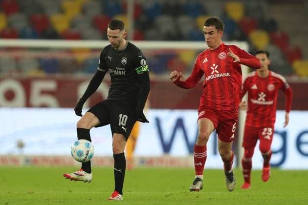 Branimir Hrgota SpVgg Greuther Fürth and Giovanni Haag Fortuna Duesseldorf battle for the ball during the 2 Bundesliga match between Fortuna Duesseldorf and SpVgg Greuther Fürth at Merkur Spiel Arena on February 28, 2025 in Duesseldorf, Germany, Germany Photo by Oliver Kaelke DeFodi Images Branimir Hrgota SpVgg Greuther Fürth and Giovanni Haag Fortuna Duesseldorf battle for the ball during the 2 Bundesliga match between Fortuna Düsseldorf and SpVgg Greuther Fürth at Merkur Spiel Arena on February 28, 2025 in Düsseldorf, Germany Photo by Oliver Kaelke DeFodi Images DFB DFL REGULATIONS PROHIBIT ANY USE OF PHOTOGRAPHS AS IMAGE SEQUENCES AND OR QUASI VIDEO Photo by Oliver Kaelke DeFodi Images