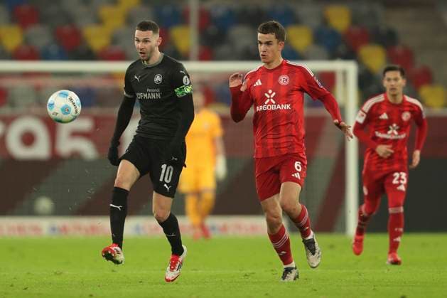 Branimir Hrgota SpVgg Greuther Fürth and Giovanni Haag Fortuna Duesseldorf battle for the ball during the 2 Bundesliga match between Fortuna Duesseldorf and SpVgg Greuther Fürth at Merkur Spiel Arena on February 28, 2025 in Duesseldorf, Germany, Germany Photo by Oliver Kaelke DeFodi Images Branimir Hrgota SpVgg Greuther Fürth and Giovanni Haag Fortuna Duesseldorf battle for the ball during the 2 Bundesliga match between Fortuna Düsseldorf and SpVgg Greuther Fürth at Merkur Spiel Arena on February 28, 2025 in Düsseldorf, Germany Photo by Oliver Kaelke DeFodi Images DFB DFL REGULATIONS PROHIBIT ANY USE OF PHOTOGRAPHS AS IMAGE SEQUENCES AND OR QUASI VIDEO Photo by Oliver Kaelke DeFodi Images