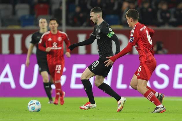 Branimir Hrgota SpVgg Greuther Fürth and Giovanni Haag Fortuna Duesseldorf battle for the ball during the 2 Bundesliga match between Fortuna Duesseldorf and SpVgg Greuther Fürth at Merkur Spiel Arena on February 28, 2025 in Duesseldorf, Germany, Germany Photo by Oliver Kaelke DeFodi Images Branimir Hrgota SpVgg Greuther Fürth and Giovanni Haag Fortuna Duesseldorf battle for the ball during the 2 Bundesliga match between Fortuna Düsseldorf and SpVgg Greuther Fürth at Merkur Spiel Arena on February 28, 2025 in Düsseldorf, Germany Photo by Oliver Kaelke DeFodi Images DFB DFL REGULATIONS PROHIBIT ANY USE OF PHOTOGRAPHS AS IMAGE SEQUENCES AND OR QUASI VIDEO Photo by Oliver Kaelke DeFodi Images