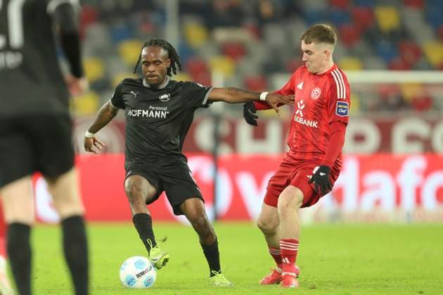 Noel Futkeu SpVgg Greuther Fürth and Isak Bergmann Johannesson Fortuna Duesseldorf in a duel during the 2 Bundesliga match between Fortuna Duesseldorf and SpVgg Greuther Fürth at Merkur Spiel Arena on February 28, 2025 in Duesseldorf, Germany, Germany Photo by Oliver Kaelke DeFodi Images Noel Futkeu SpVgg Greuther Fürth and Isak Bergmann Johannesson Fortuna Duesseldorf battle for the ball during the 2 Bundesliga match between Fortuna Düsseldorf and SpVgg Greuther Fürth at Merkur Spiel Arena on February 28, 2025 in Düsseldorf, Germany Photo by Oliver Kaelke DeFodi Images DFB DFL REGULATIONS PROHIBIT ANY USE OF PHOTOGRAPHS AS IMAGE SEQUENCES AND OR QUASI VIDEO Photo by Oliver Kaelke DeFodi Images